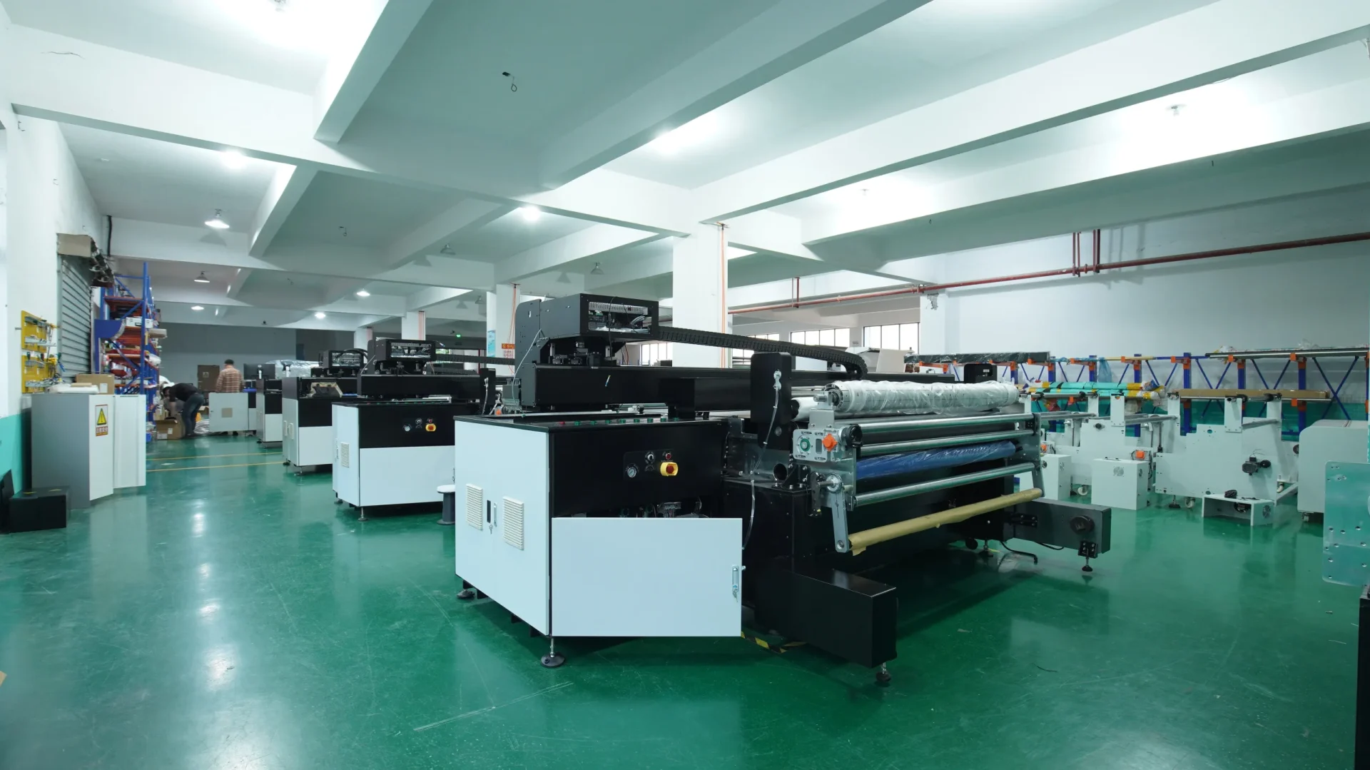 Industrial textile printers on H·EASY's Shenzhen factory production floor