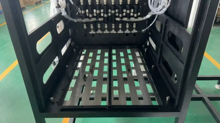 Welded steel frame and precision head-plate structure inside an H-Series textile printer
